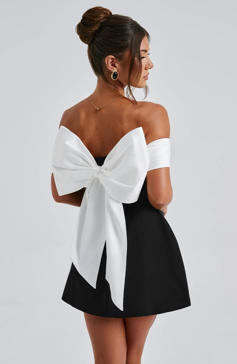 Big bow decoration at back, off shoulder, high waist, sleeveless.