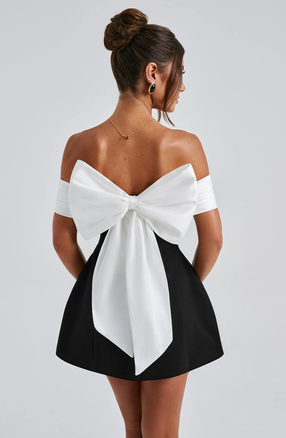 Big bow decoration at back, off shoulder, high waist, sleeveless.