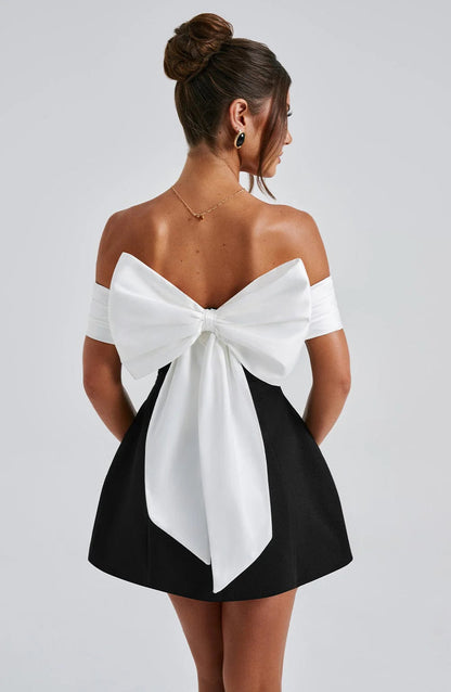 Big bow decoration at back, off shoulder, high waist, sleeveless.