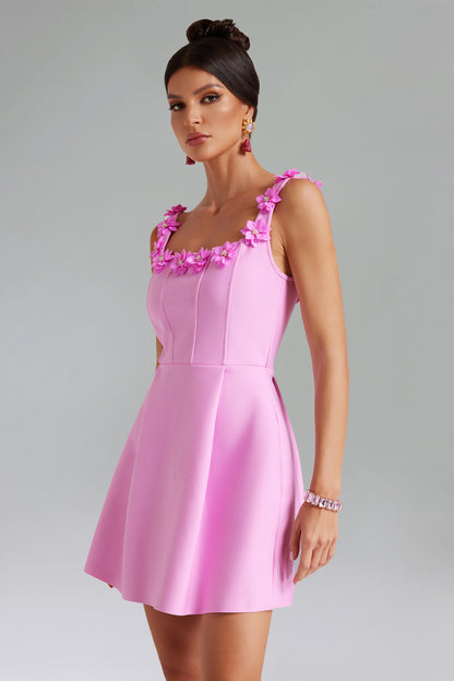 Beautiful dress with 3D effect flowers and a vibrant color.