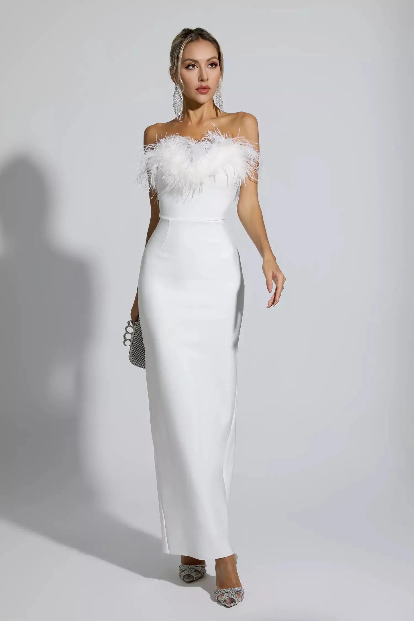 Elegant feathered midi dress.