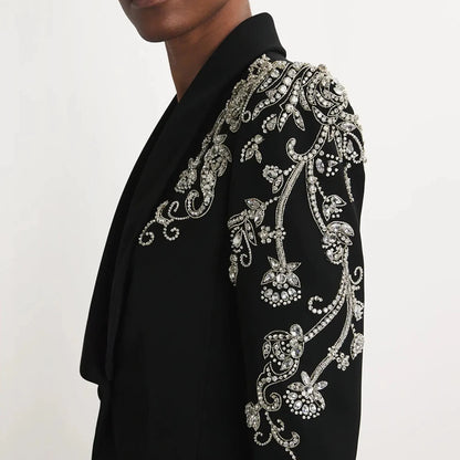 Elegant blazer with very shiny stones.