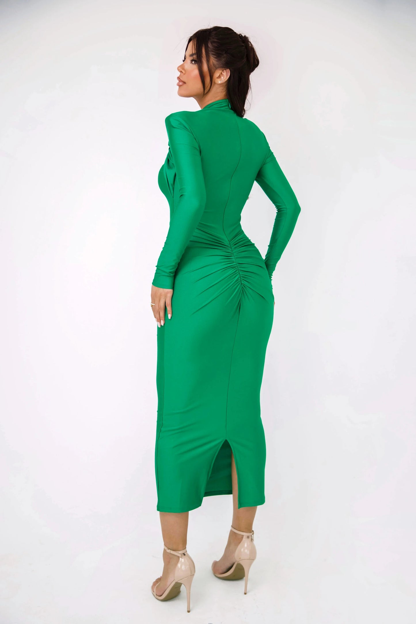 Long sleeved elastic, tight long dress.